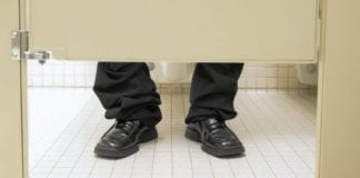PASS THE TISSUE MEN ACROSS THE UK admit to masturbating in the toilet at work Man in toilet cubicle 450x270