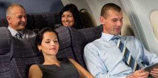 How to fly like a gentleman? Don’t hit the booze, give your fellow passengers a hand and ask before reclining your seat Airplane passenger relax during flight cabin sleep