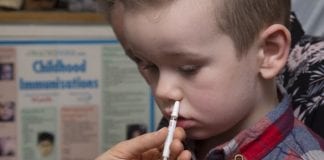 Parents should get their children vaccinated against influenza now Don’t let flu spoil your children’s Christmas holidays / Dylai rhieni sicrhau bod eu plant yn cael brechiad rhag y ffliw nawr Child flu Vaccination MFG0002 680x464