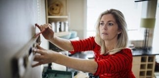 More than half of homeowners in Wales don’t set aside money for essential DIY and repairs, study finds Woman doing DIY