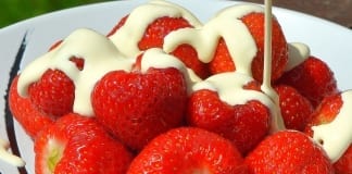 Warmer winter and spring mean an early summer –British strawberries are now on supermarket shelves in abundance Strawberries and cream Wimbledon 2014