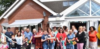 Ty Robin disability short breaks celebrates Action for Children’s 150th birthday in style Families friends and staff celebrating at Ty Robin