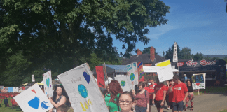 Teenagers from Plas Madoc celebrate Eisteddfod’s ‘Youth Day’ with ‘Peace Walk’ in Llangollen. Peace march concluded in Eisteddfod grounds