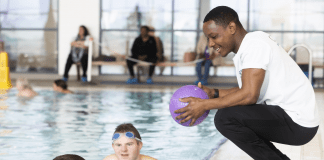 Nominations for the 22nd UK Coaching Awards are now open. Coach Fanuel Chivasa right coaching two of his participants in the pool ©UK Coaching