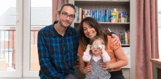 Family move into their dream three-storey home in Cardiff MH 010719 Lovell 011 Carys Adam and their daughter in the living room of their Birchwood style home