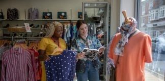 Shop Volunteers are ‘Priceless’ says Red Cross Red Cross Volunteer in a shop