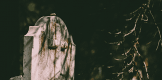 Temporary closure of cemeteries selective focus tombstone 1121906