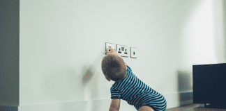 NICEIC OFFERS GUIDANCE ON KEEPING BRITIAIN’S SWITCHED-ON KIDS SAFE THIS CHILD SAFETY WEEK Baby reaching for plug socket