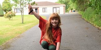 7-year-old Mattie from Pembrey ‘climbs’ Pen y Fan for Action for Children reaching the summit scaled