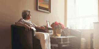 LGA RESPONDS TO HEALTH FOUNDATION REPORT ON SOCIAL CARE DURING CORONAVIRUS woman looking towards sunny window