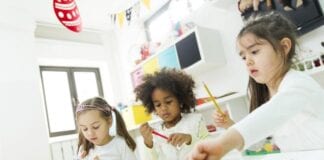 LGA RESPONDS TO EARLY YEARS ALLIANCE REPORT 3 girls at nursery doing art