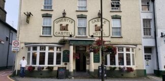 Closure notice issued to a pub in Ceredigion front of hotel on high