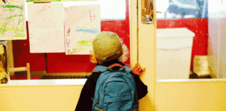 LGA STATEMENT: Schools reopening Primary schoolboy with backpack