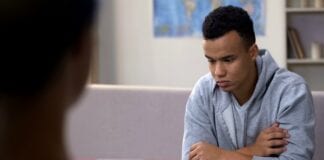 1 in 5 people in Wales feel their support system has shrunk and have fewer people to talk to about their mental health Young man looking low motortion AdobeStock resized