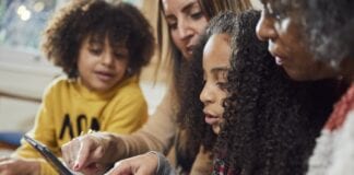 NSPCC Cymru/Wales receives funding to help keep vulnerable children safe online Children and adults pictured are models. Credit Tom Hull