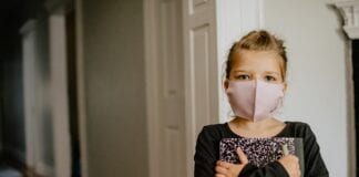 LGA – Library investment key to helping children catch up following pandemic girl with school book