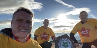 Finance staff reunite on summit of Pen y Fan for unique team meeting pen y fan group