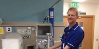 Hywel Dda Health Charities on a new ECG machine for the Renal Unit at Withybush Hospital Withybush renal unit ECG machine picture Deputy Clinic Manager Steve Gauder
