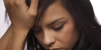 Just under a third of people in Wales report decrease in self-esteem – new report out from Relate bigstock Sad young woman looking down 16228964