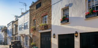 Homebuyers pay the most 30 minutes from the city street of mews houses in belgravia district of royalty free image 1081706164 1555286043