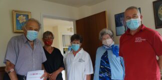 40 years volunteering for Royal Voluntary Service Ceredigion Country Cars william edwards Medal scaled