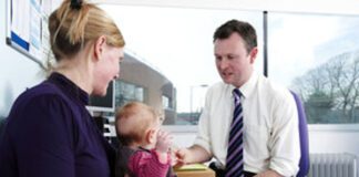Parents warned to look out for respiratory illness in children mum and toddler with male gp white