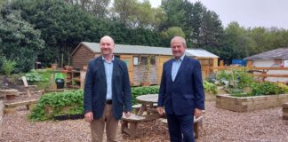 Cefin Campbell MS Views Impact of Llanelli-based Charity The Centre For Building Social Action Cefin Campbell MS and Mike Theodoulou at the CBSA Garden