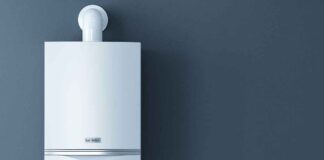 Brits urged to check boilers now as faults send energy bills soaring modern boiler wall