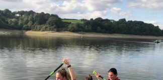 Study Reveals How Water-Based Activities Can Help Create A Healthy Work-Life Balance paddleboarding together