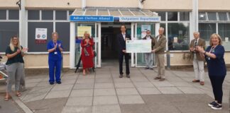Hywel Dda Health Charities on £50,000 biopsy machine purchased to benefit Hywel Dda patients Biopsy machine for urology cheque presentation photo new