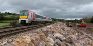 Rock and Rail: 8,000 tonnes of ‘rock armour’ installed to protect the future of flood-prone borders’ railway Vinyards farm TfW train 2