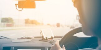 WARNING: Brits are unknowingly dangerous driving thanks to “lucky” habits 0 Man driving car on road selective focus