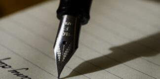 Tips to Writing a Good Essay aaron burden y02jEX B0O0 unsplash 1