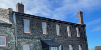 Restoration underway of listed railway station building in Llanelli 2022 exterior Goodshed1