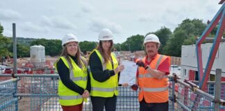 Resident helped into employment thanks to Caerphilly partnership Anthony receiving certificate at CGV