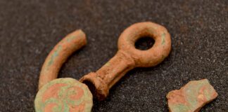 FURTHER ITEMS RELATING TO THE PEMBROKESHIRE CHARIOT DECLARED TREASURE Decorated bridle bit fragments and strap union fragment1 scaled