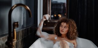 Experts encourage people to take a HOT bath during the heatwave to cool down bathing