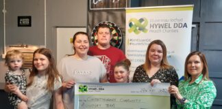 Family raises over £4,000 for charity in memory of daughter Presentaion Photo 1