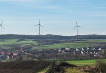 Give rural areas more time to transition to low carbon heating, Government urged countryside fields windturbines sl
