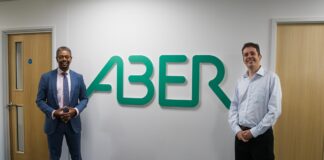 Economy Minister visits ABER Instruments – a measure of success Economy Minister Vaughan Gething with the Managing Director of Aber Instruments Matthew Lee min