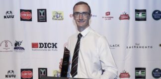 Canmol cigyddion Cymru am safon eu hymddangosiad cyntaf yn Her Cigyddion y Byd Ben with trophy min scaled