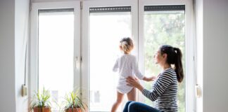 2025 Gas Boiler Ban alpha boilers woman and baby at window 2 min scaled