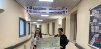 Coffee morning raises £5,000 for Bronglais Chemo Appeal Nerys Thomas coffee morning cheque presentation picture