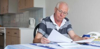 Ageing Expert on Benefits for the Elderly; Are Your Parents Claiming What They’re Entitled To? 984x475 man paperwork 044 min