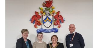 Train naming competition winner pays special visit to Caerphilly Council headquarters Morgan visits Penallta House min
