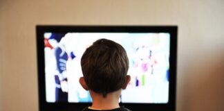 Over half of working parents in Wales rely on TV and YouTube to keep their kids entertained during school holidays children ge76c81852 1280 min