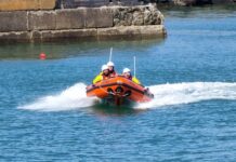 RNLI Fishguard rescue kayaker in danger Photo 1 min