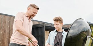 Hosting the perfect summer BBQ: a local housebuilder’s ‘top tips’ for new homeowners father and son barbecuing scaled