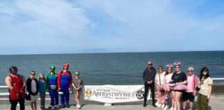 Nursing cohort walk promenade for Bronglais chemo unit Aberystwyth nurses sponsored walk min