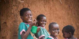 Mary’s Meals is honoured with prestigious Princess of Asturias Award Children in Malawi enjoying their daily serving of Marys Meals min scaled